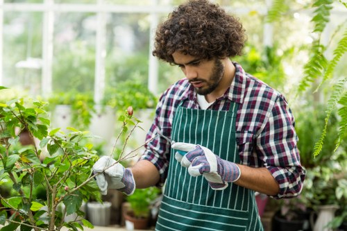 Technician wearing PPE during lawn maintenance